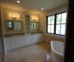 Master bathroom vanity and tub area