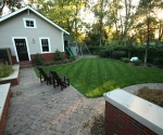 New view of the garage and backyard.